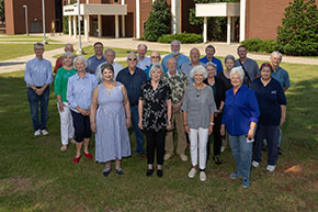 A group of people standing together. Link to Gifts from Retirement Plans