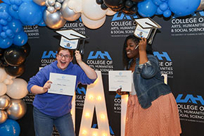 Students celebrating their graduation together. Link to Beneficiary Designations