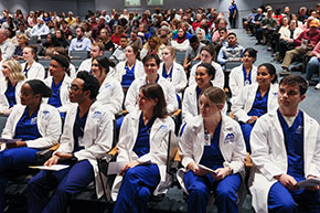 Medical students sitting in a classroom. Link to Gifts by Estate Note